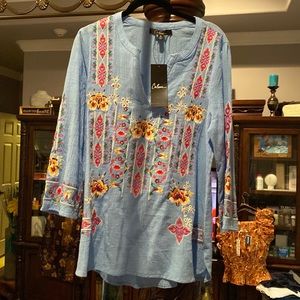 NWT. Blue top with embroidered detail